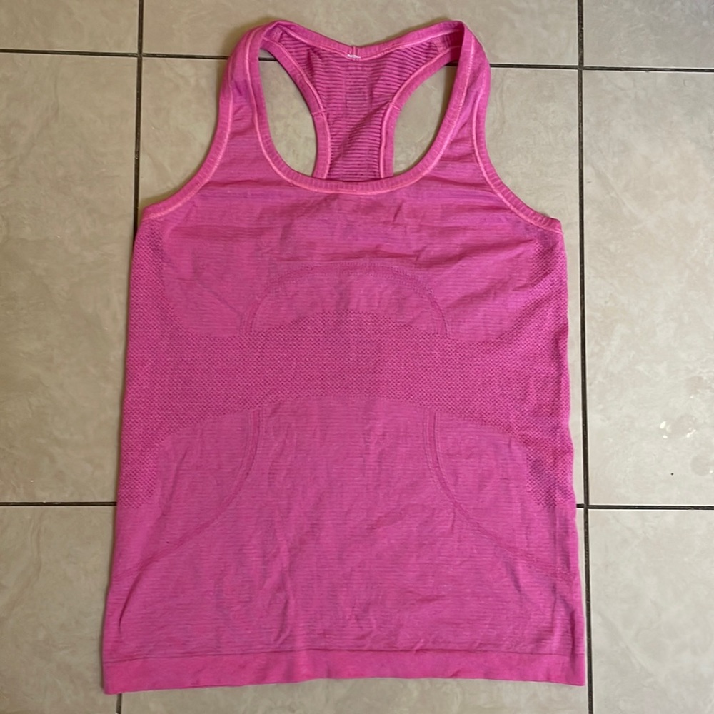 Hot pink Lululemon workout top